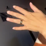 Gen 3 Rose Gold Health Tracking Ring — rose-gold ring worn on an outstretched hand