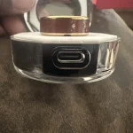 Gen 4 — charging case USB port close-up.